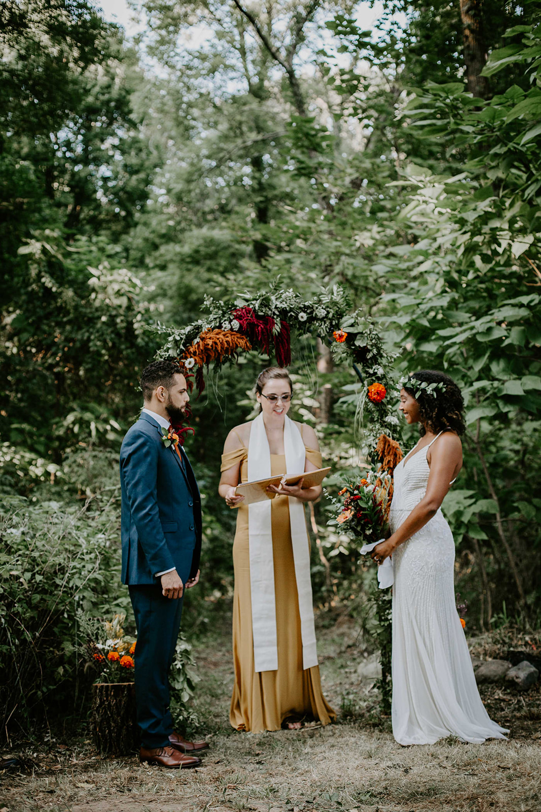 Officiant with Bride and Groom. Outdoor wedding. intimate wedding photography. Michigan photographer. 