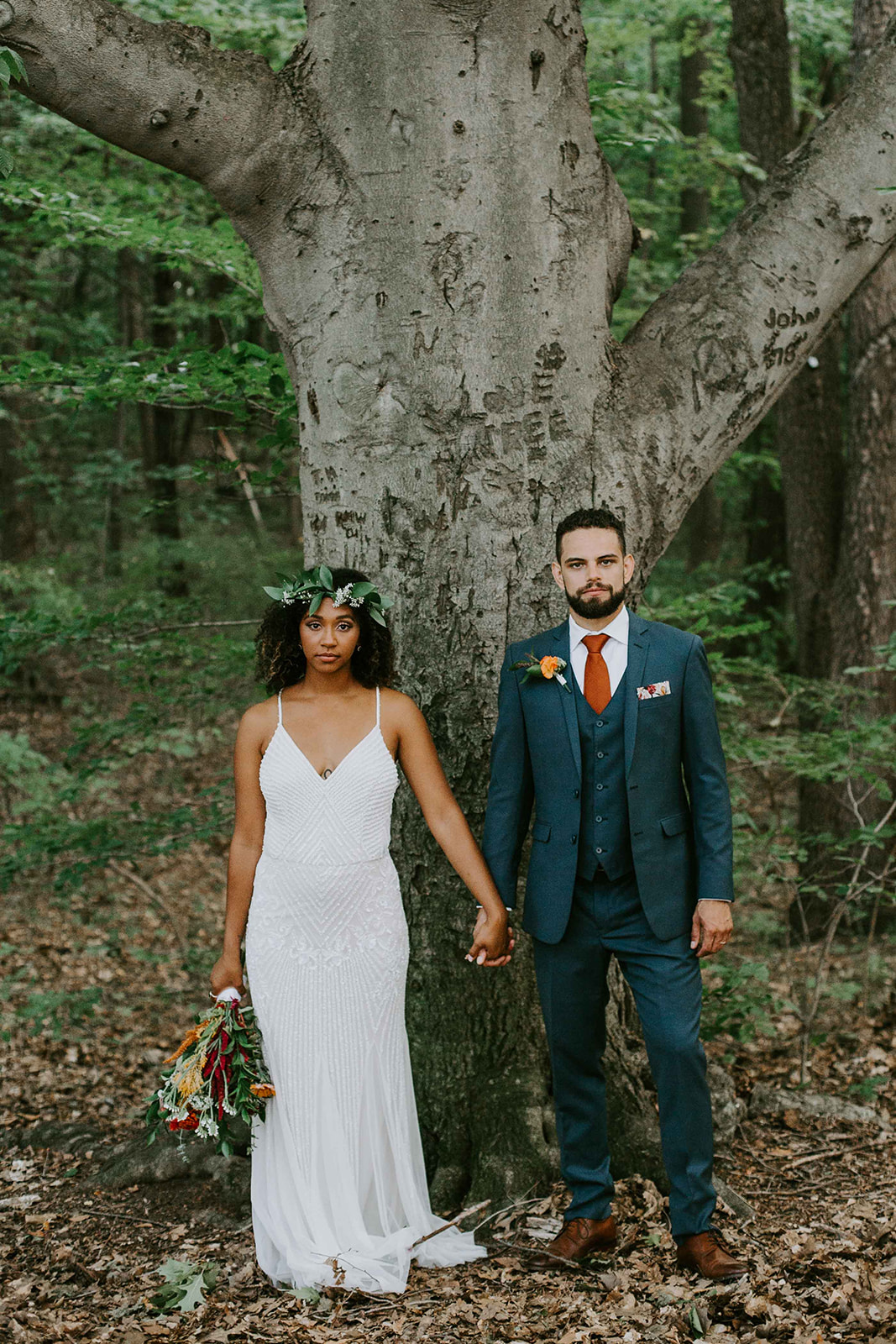 Bride and groom in front of tree. Outdoor wedding. intimate wedding photography. Michigan photographer. 