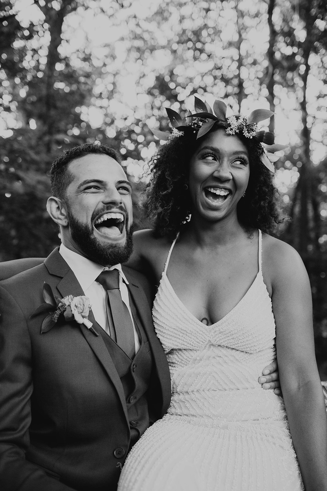Bride and groom laughing. Black and white photography. Outdoor wedding. intimate wedding photography. Michigan photographer. 