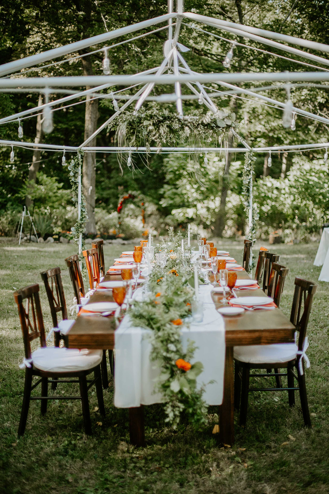 wedding reception table setting. Orange, green and white. intimate wedding photography. michigan photographer. 