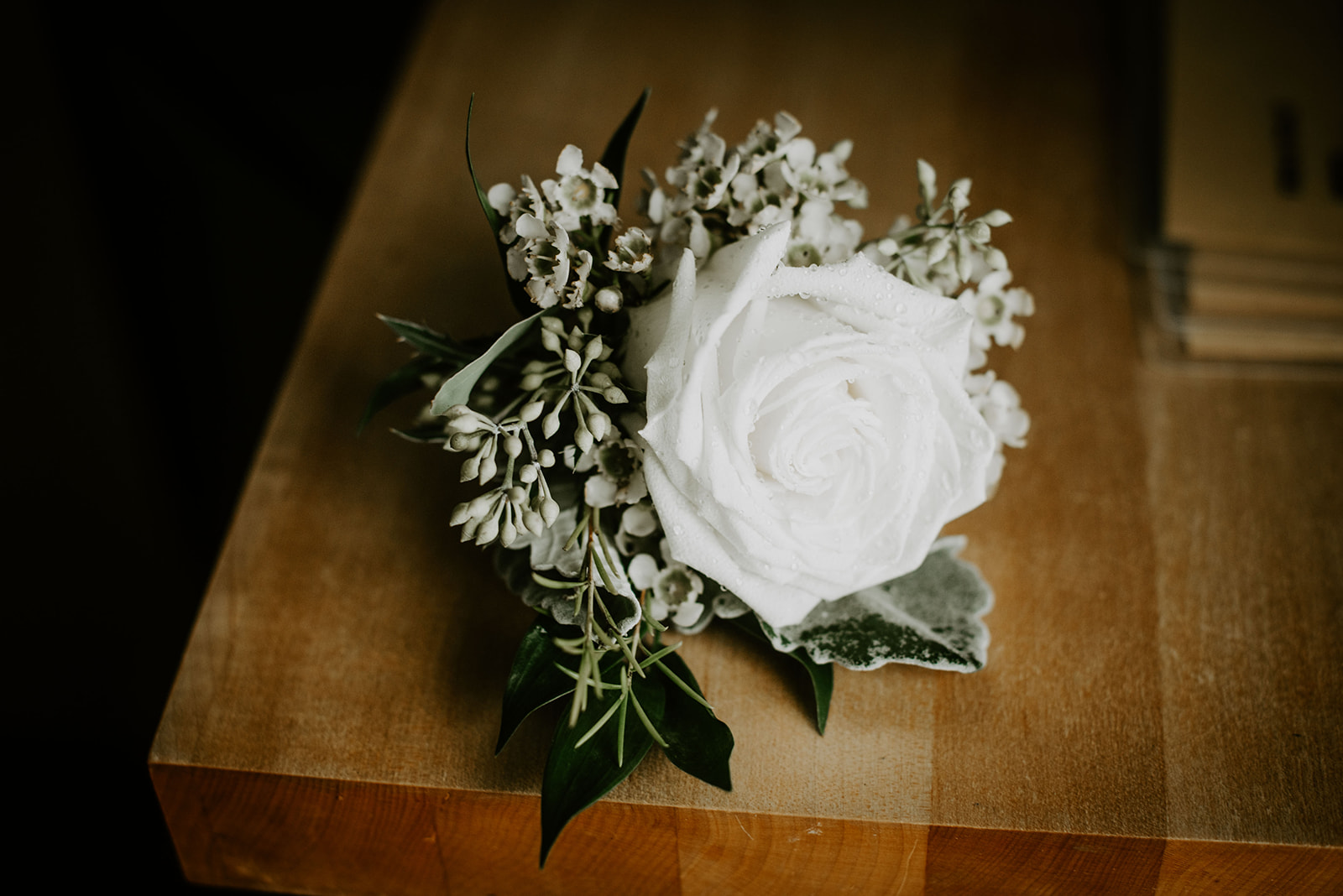 White rose boutonniere. Michigan wedding photographer.  