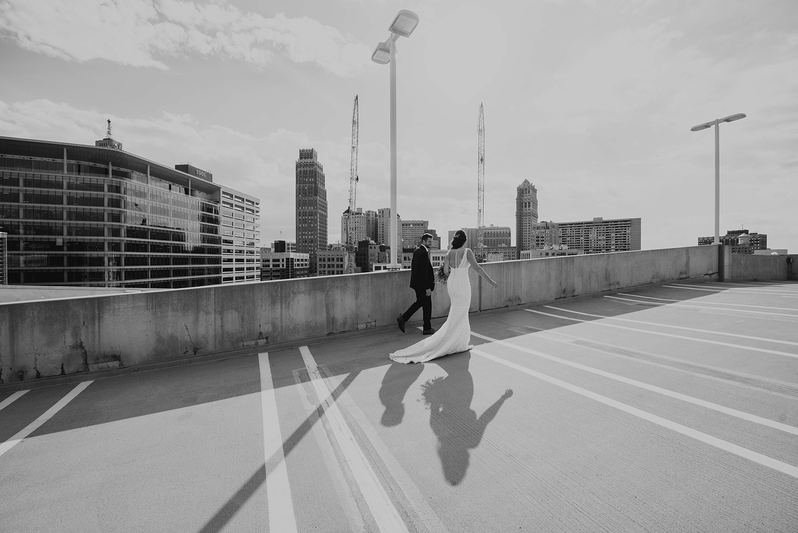 Bride and Groom. Bride and groom in city. Detroit wedding. Detroit, MI. Michigan wedding photographer. Elopement photographer. Black and white photography.