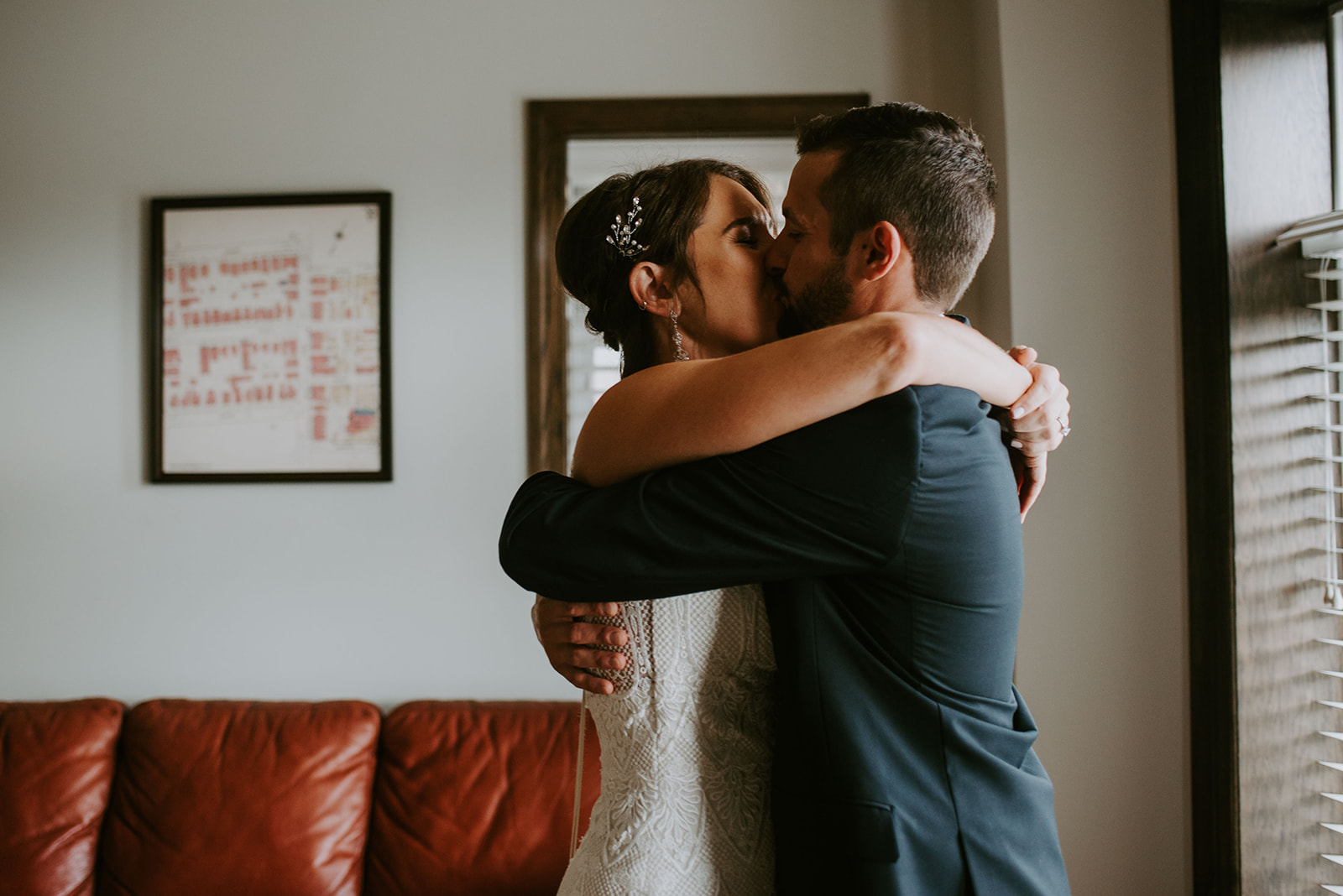 Bride and Groom kiss after first look. Michigan wedding photographer.
