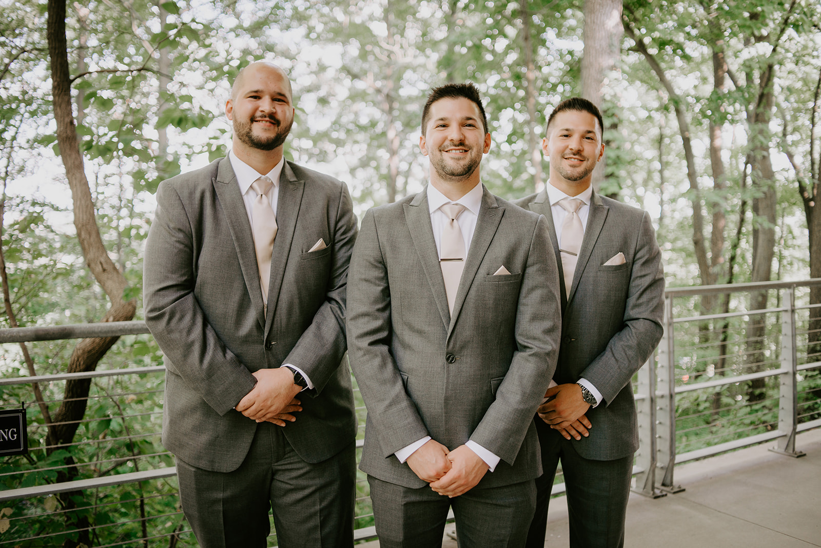 grooms at john ball zoo bissell treehouse in grand rapids michigan wedding photographer