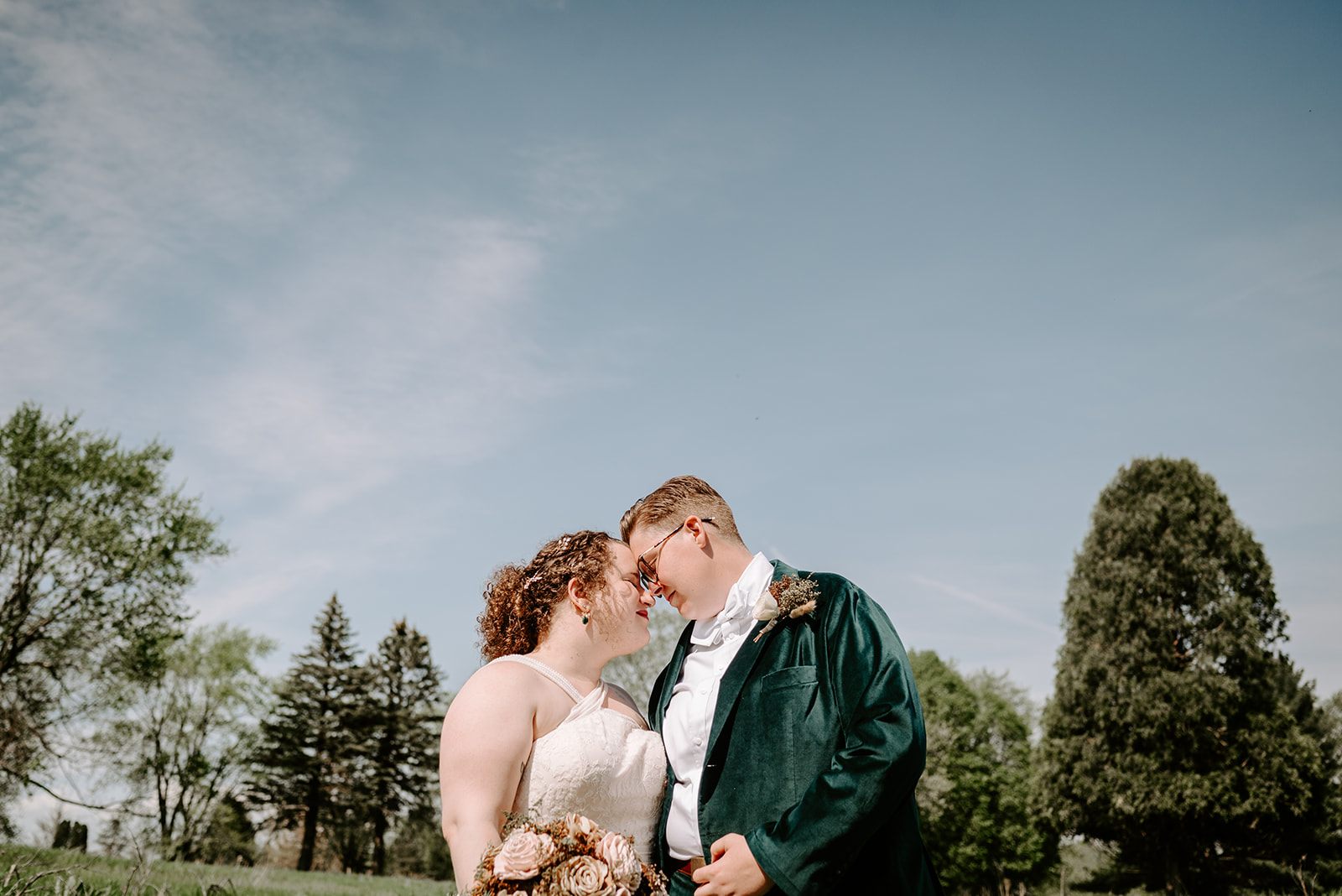 LGBTQ affirming wedding photographer Grand Rapids Backyard wedding elopement Two brides Butch bride Queer Elopement