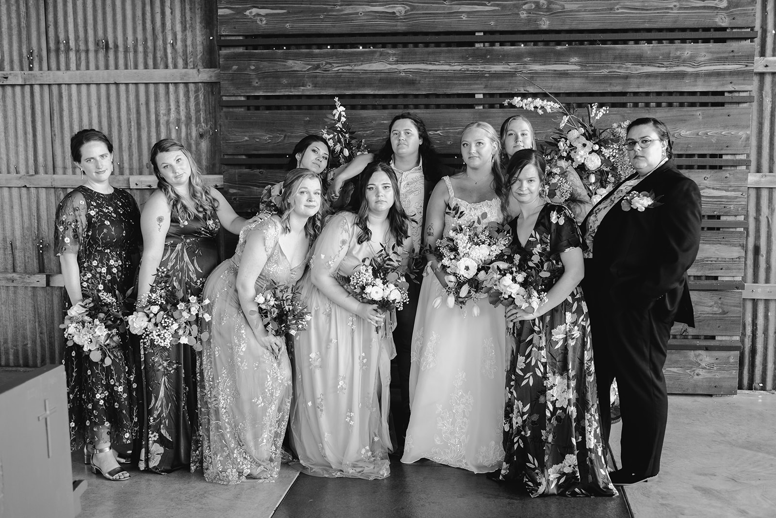 michigan spring DIY lesbian wedding at black sheep shelter with wedding party black and white photo
