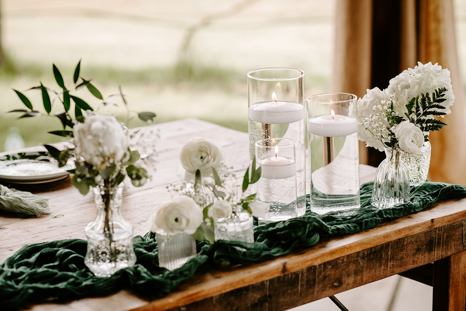 michigan spring DIY lesbian wedding at black sheep shelter candle detail table photo