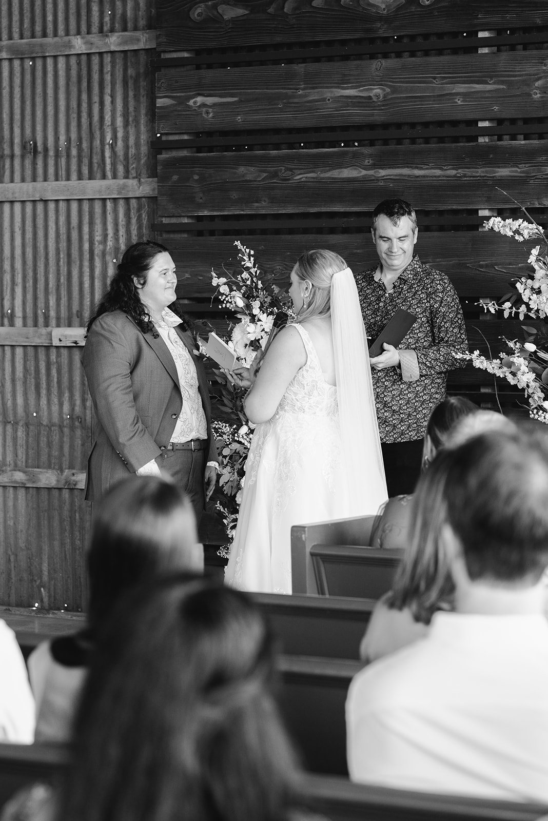michigan spring DIY lesbian wedding at black sheep shelter black and white ceremony photo