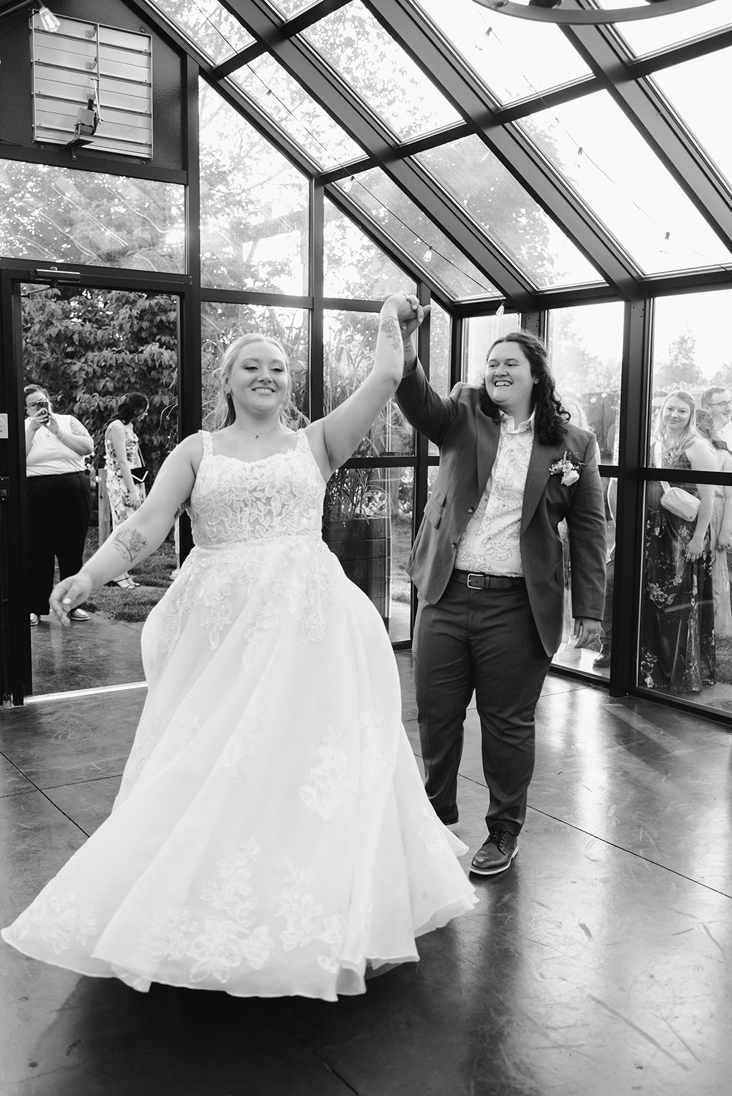 michigan spring DIY lesbian wedding at black sheep shelter black and white photo of first dance