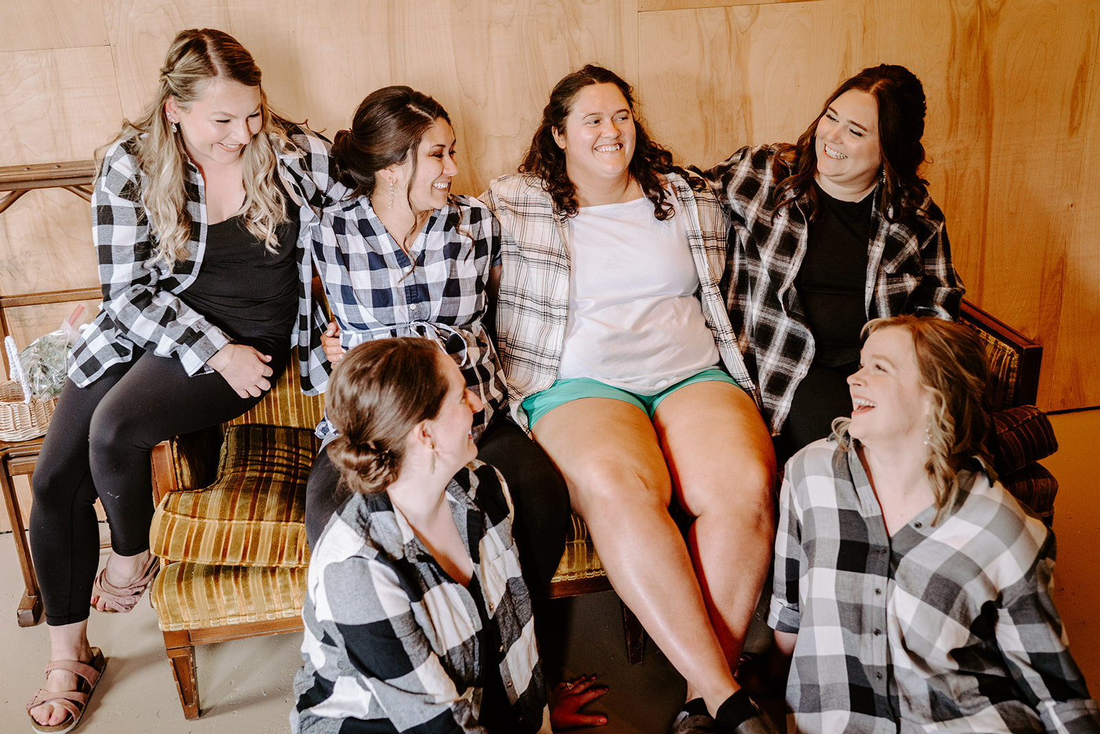 michigan spring DIY lesbian wedding at black sheep shelter getting ready with group of friends