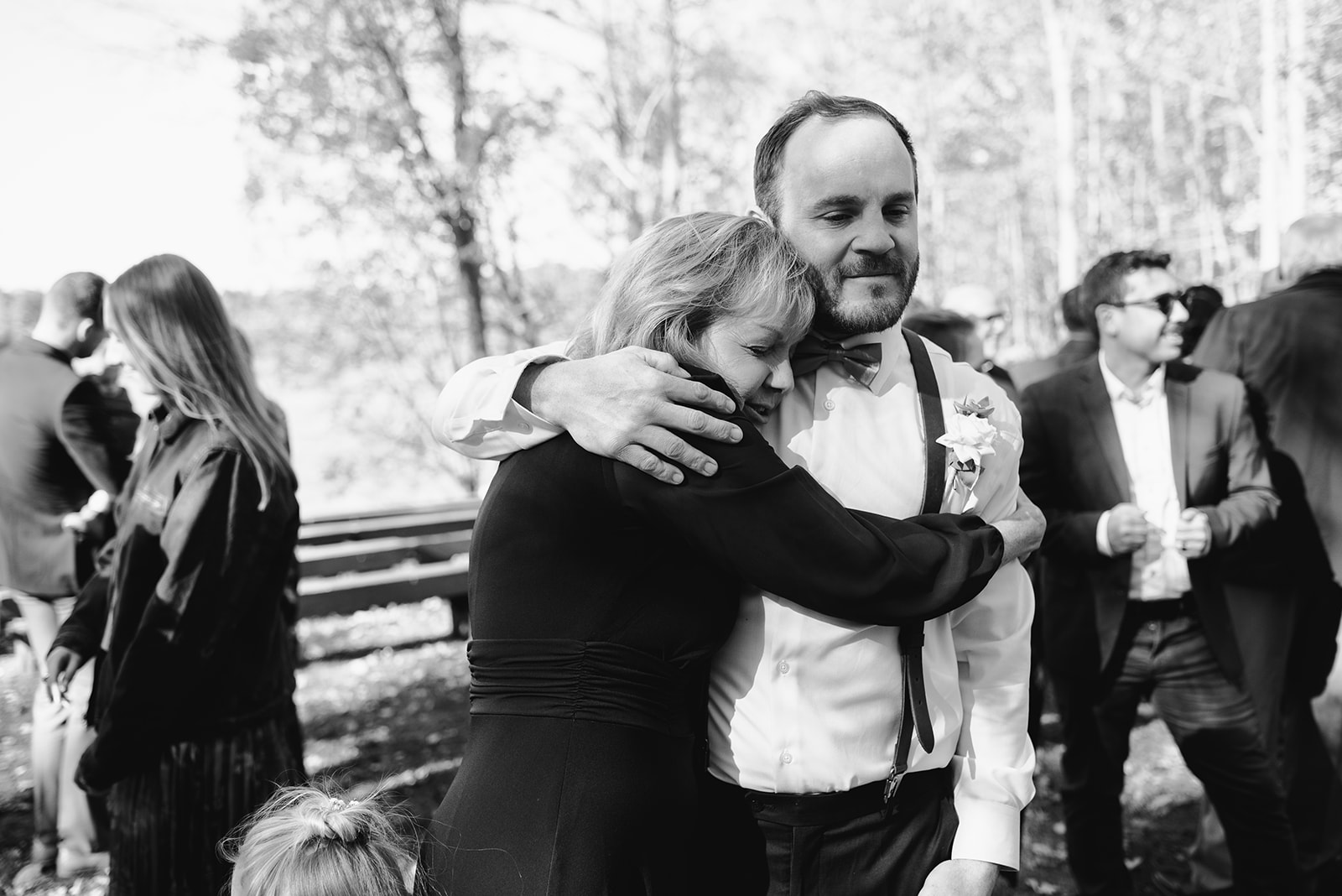 black and white photo of groom and mom fall wedding at camp merrie woode by grand rapids wedding photographer Liv Lyszyk Photography