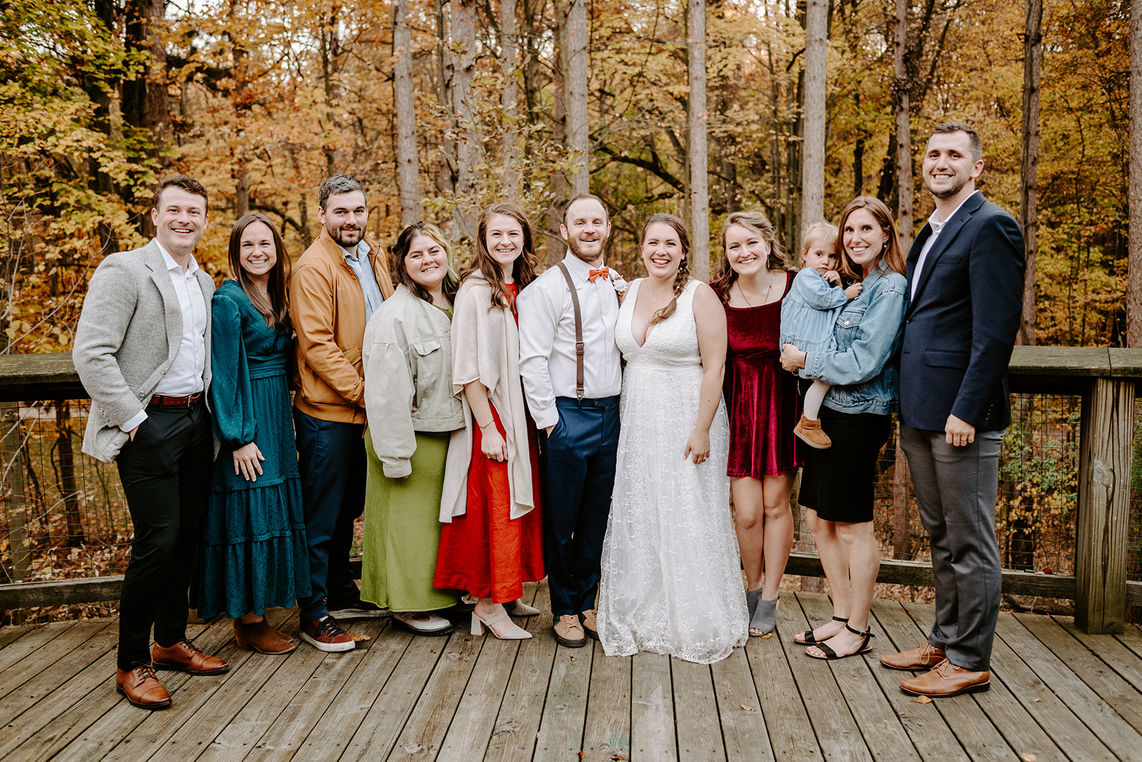 friend photo at fall wedding at camp merrie woode by grand rapids wedding photographer Liv Lyszyk Photography