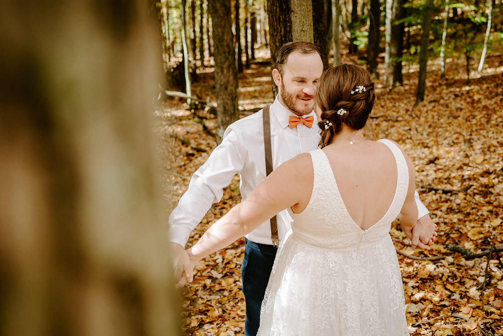 first look  fall wedding at camp merrie woode by grand rapids wedding photographer Liv Lyszyk Photography