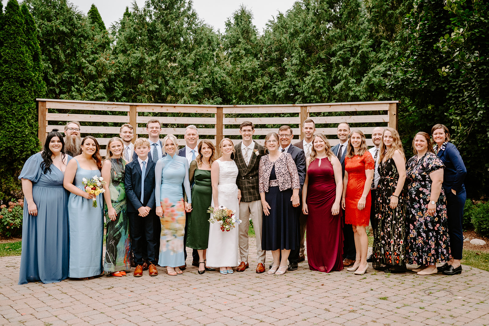 large family photo at greenhouse wedding at goldner walsh greenhouse in pontiac michigan by grand rapids and west michigan wedding photographer Liv Lyszyk Photography