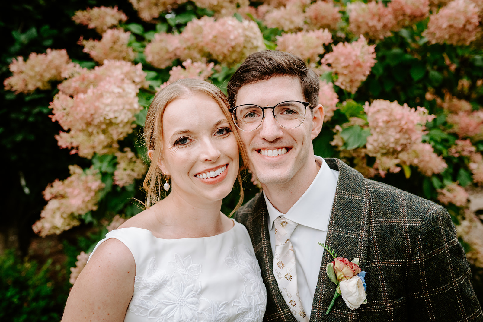 bride and groom portrait at greenhouse wedding at goldner walsh greenhouse in pontiac michigan by grand rapids and west michigan wedding photographer Liv Lyszyk Photography