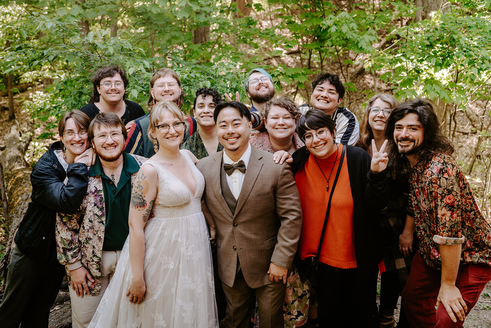 bride and groom with friends at pj hoffmaster state park chinese american elopement photographed by Grand Rapids multicultural wedding photographer Liv Lyszyk Photographer